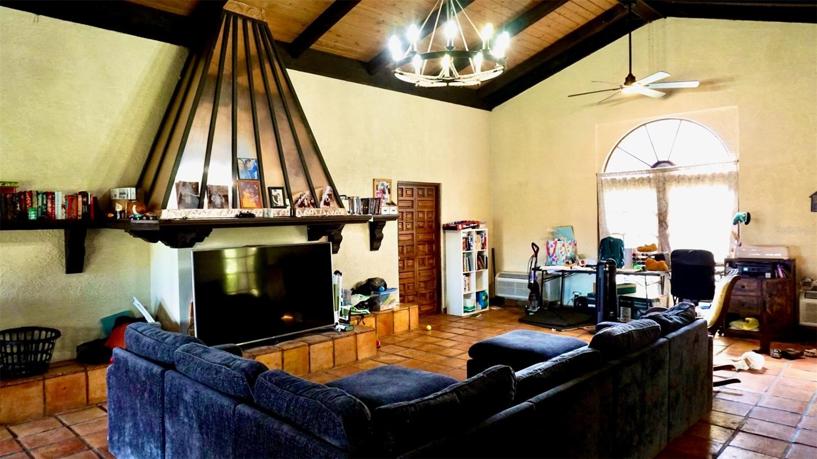 Inside villa with wood burning fireplace