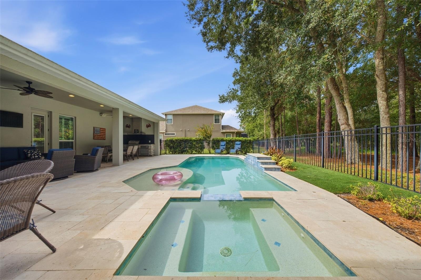 Stunning pool and spa in private backyard