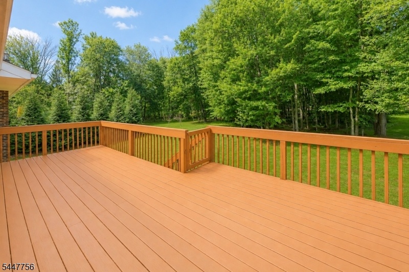 Deck overlooking 1.05 acre lot