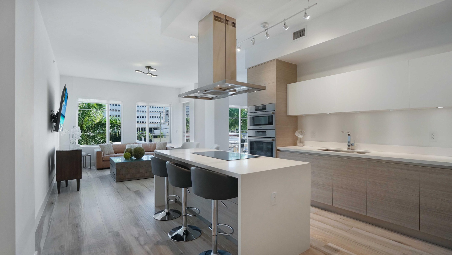 Open-concept living with Italian cabinetry, premium appliances, and contemporary finishes.