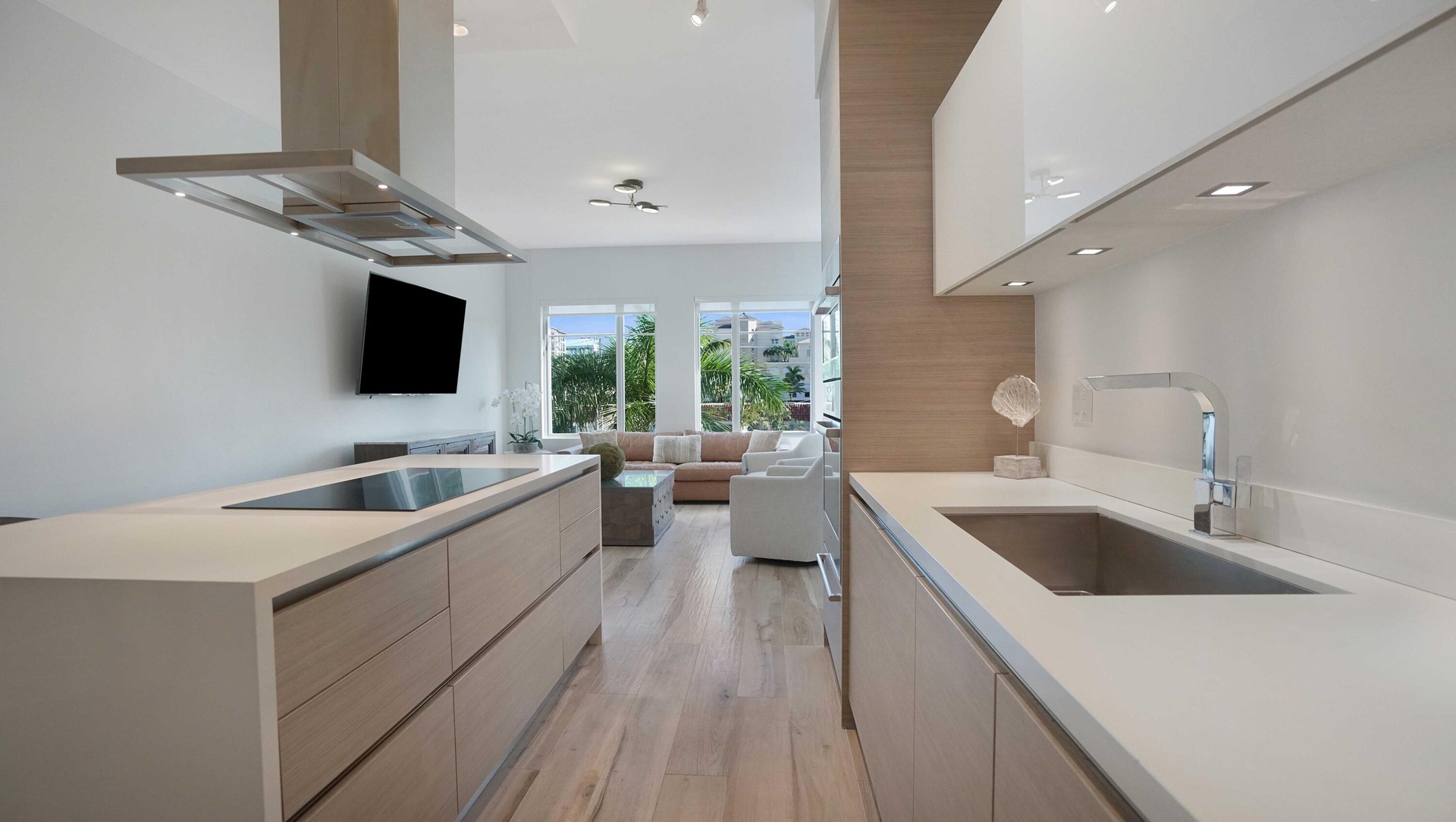 Contemporary Italian kitchen with premium appliances and open-concept design at Tower 155 in Downtown Boca Raton.