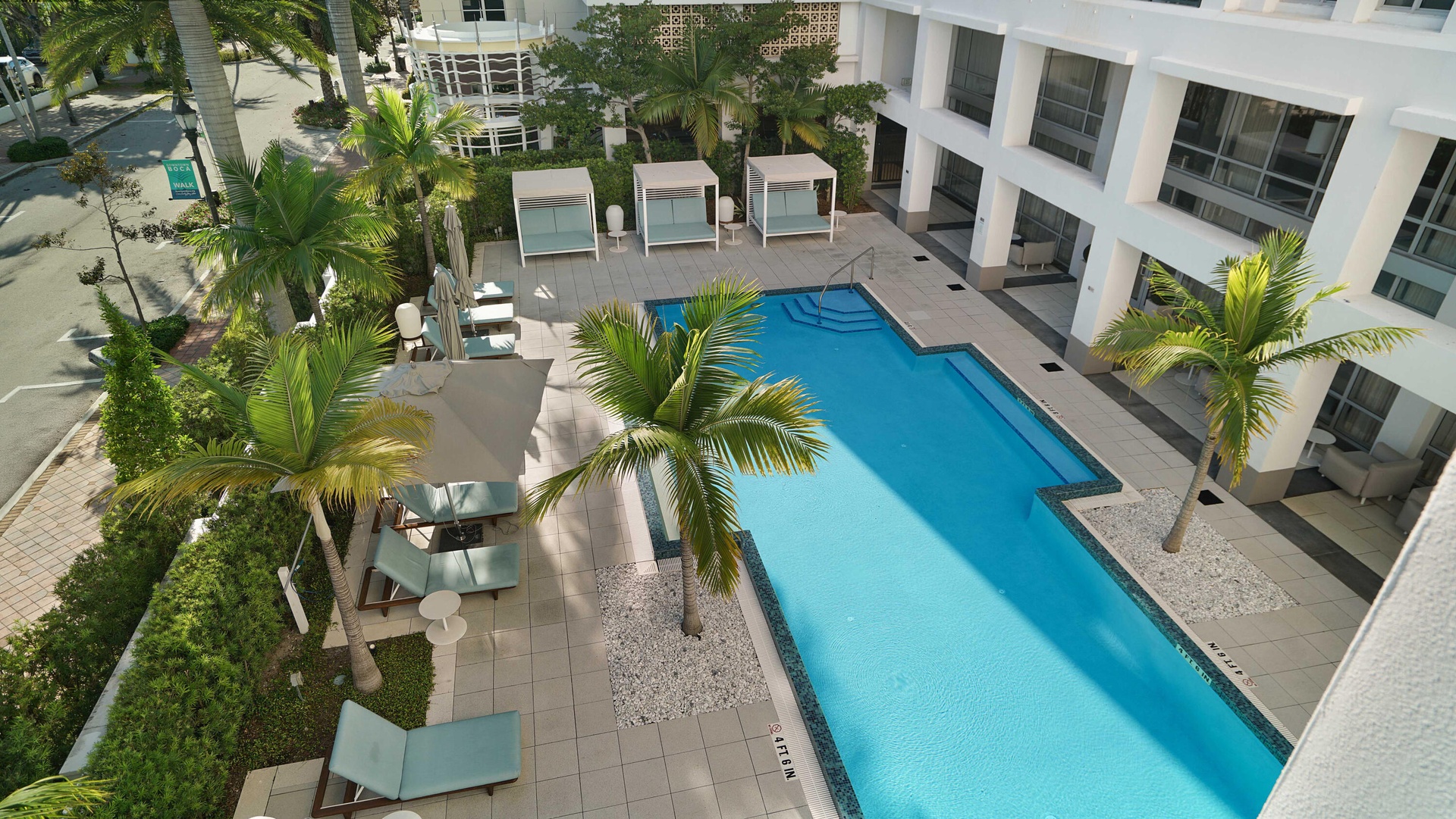 Resort-style pool and landscaped courtyard