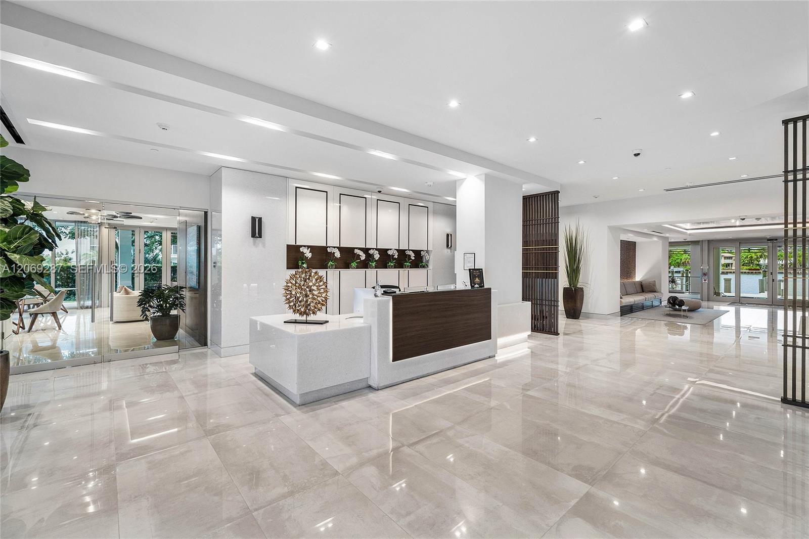 An elegant reception area with dedicated concierge service provides a welcoming and attentive arrival experience.