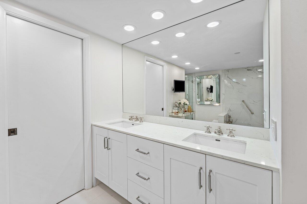 Double Sinks, Enclosed Toilet and Linen Closet