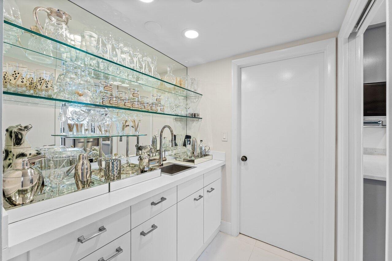 Wet Bar with Laundry Room Beyond