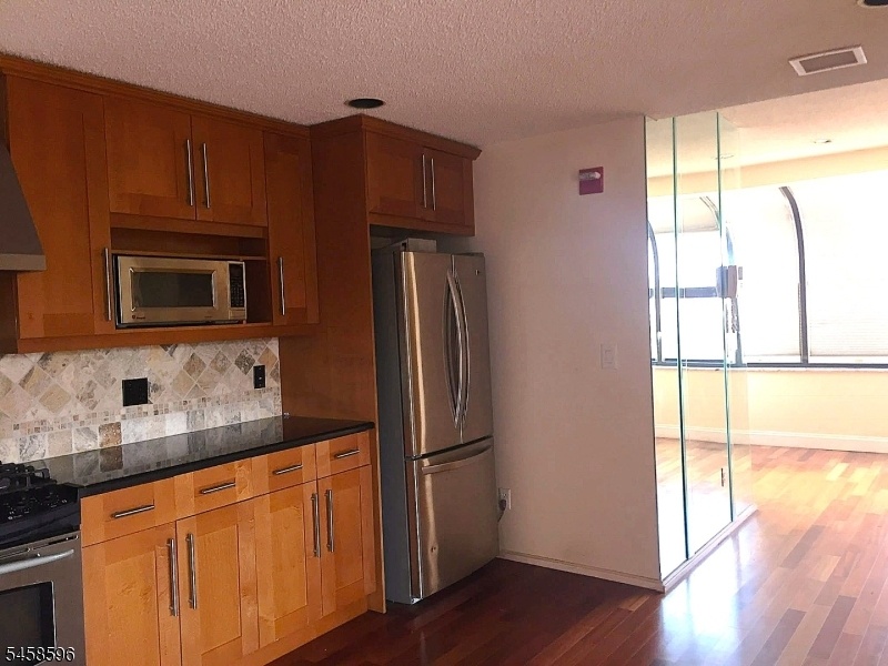 Unit2-Kitchen-Elevator -Dining