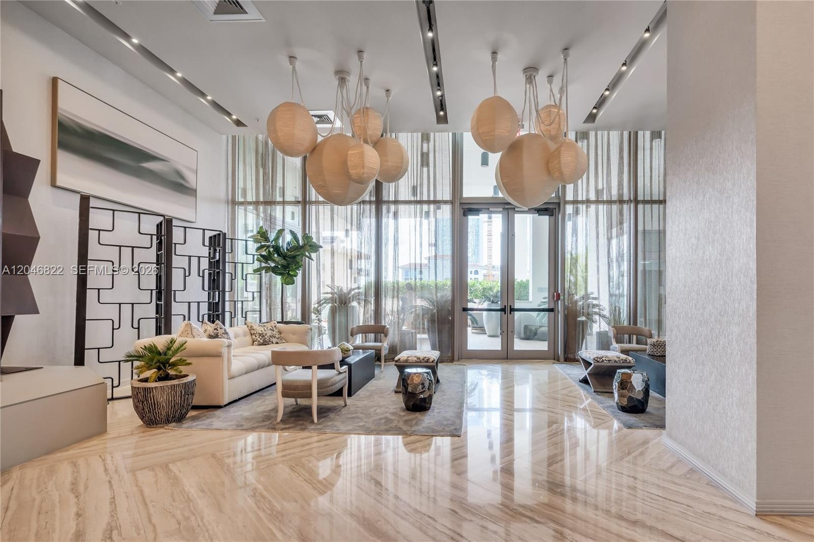 Designer resident lounge with curated seating at Biscayne Beach