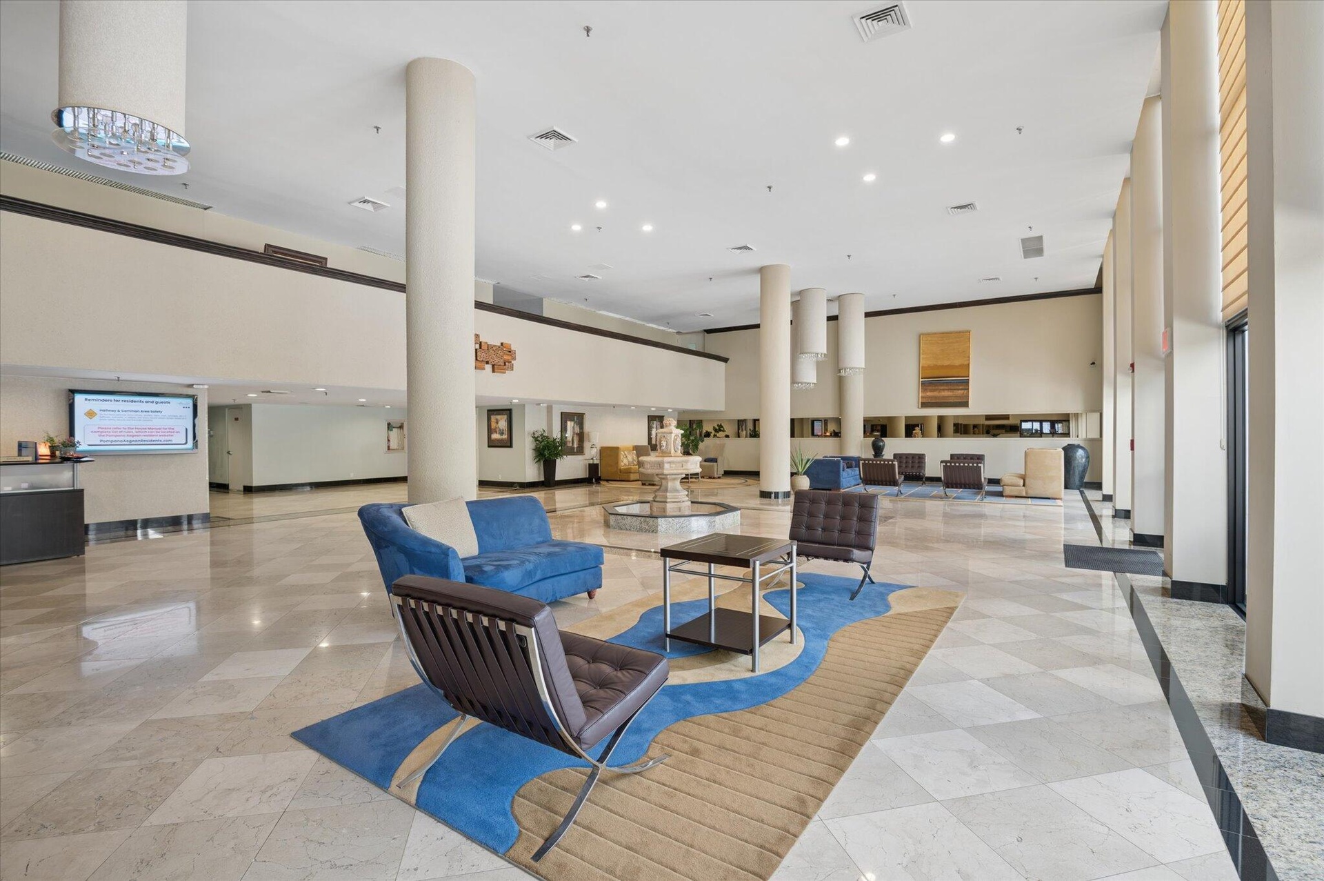 ELEGANT LOBBY WITH SECURITY ATTENDANT FOR YOUR SAFETY AND CONVENIENCE.