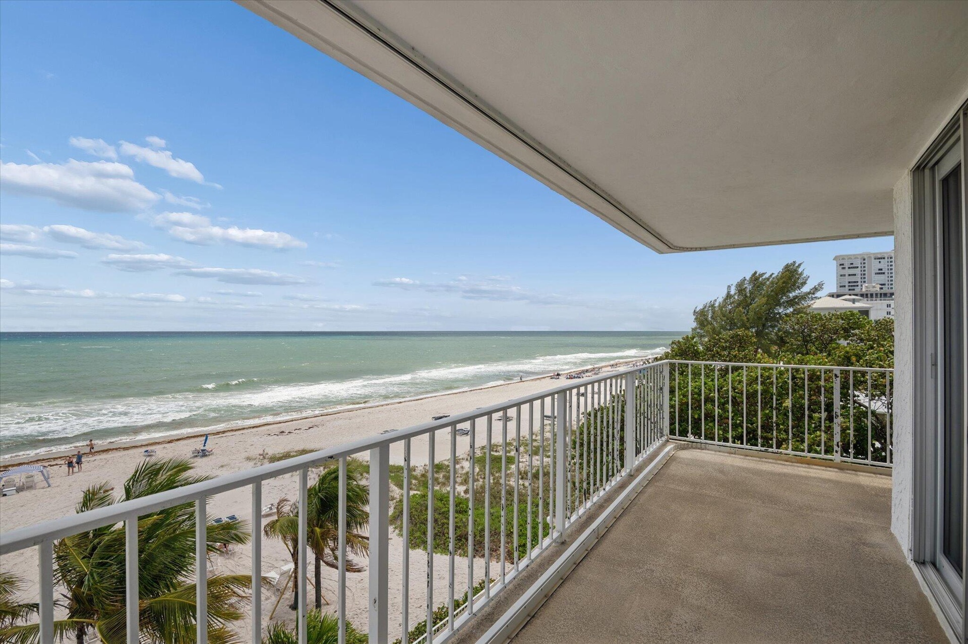 WRAP-AROUND CORNER UNIT BALCONY WITH EAST AND SOUTH VIEWS.