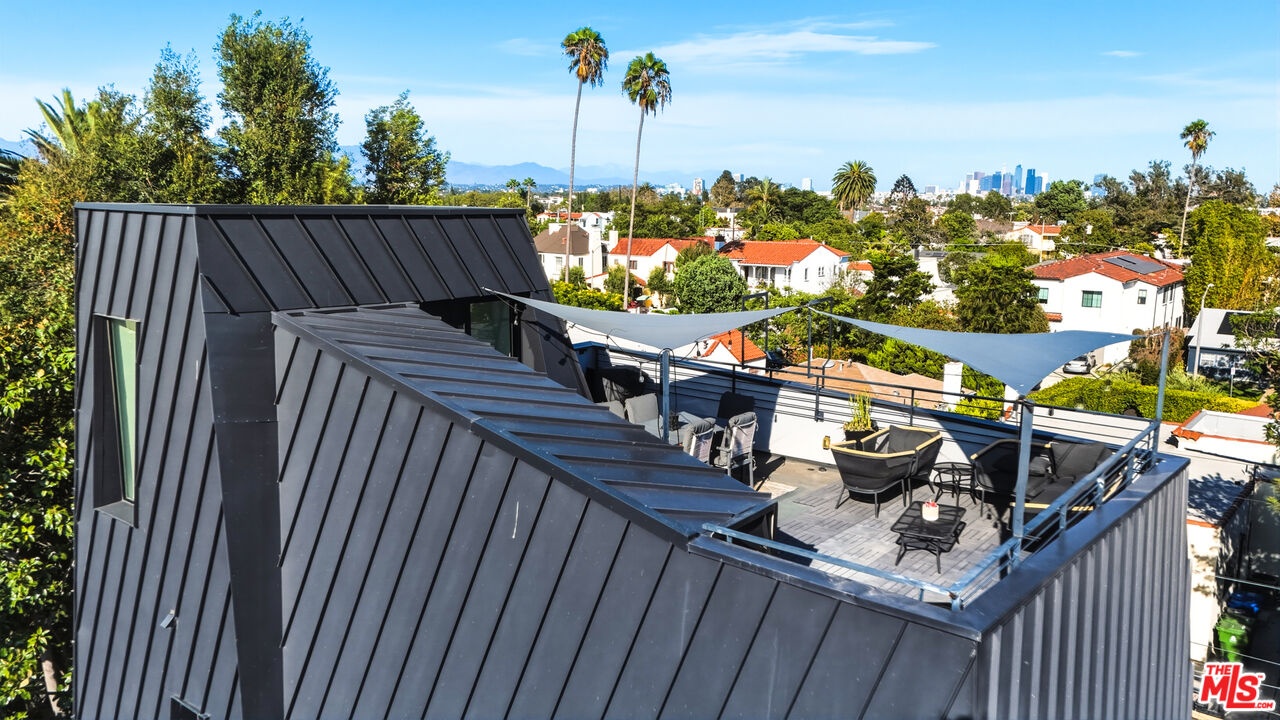 Private rooftop patio with swe