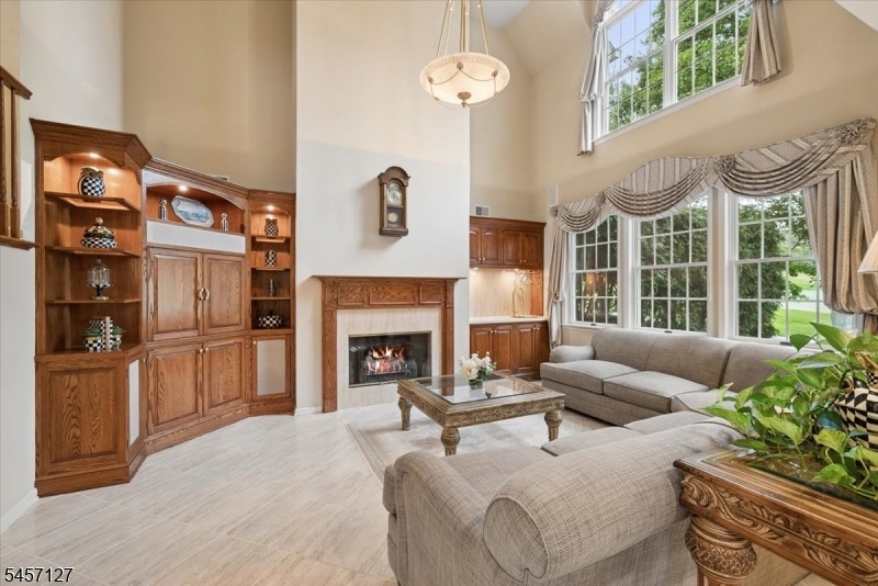 Family Rm w/ Built-Ins & Frplc