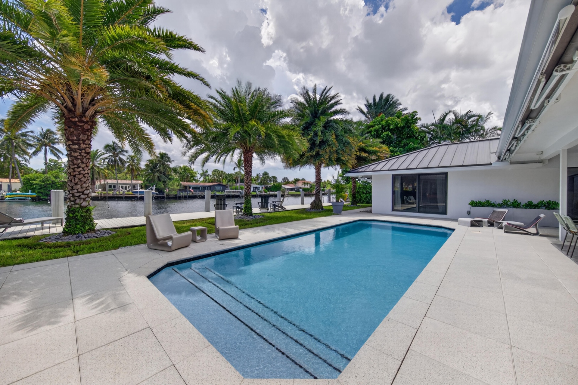 From pool and patio overlooking the water