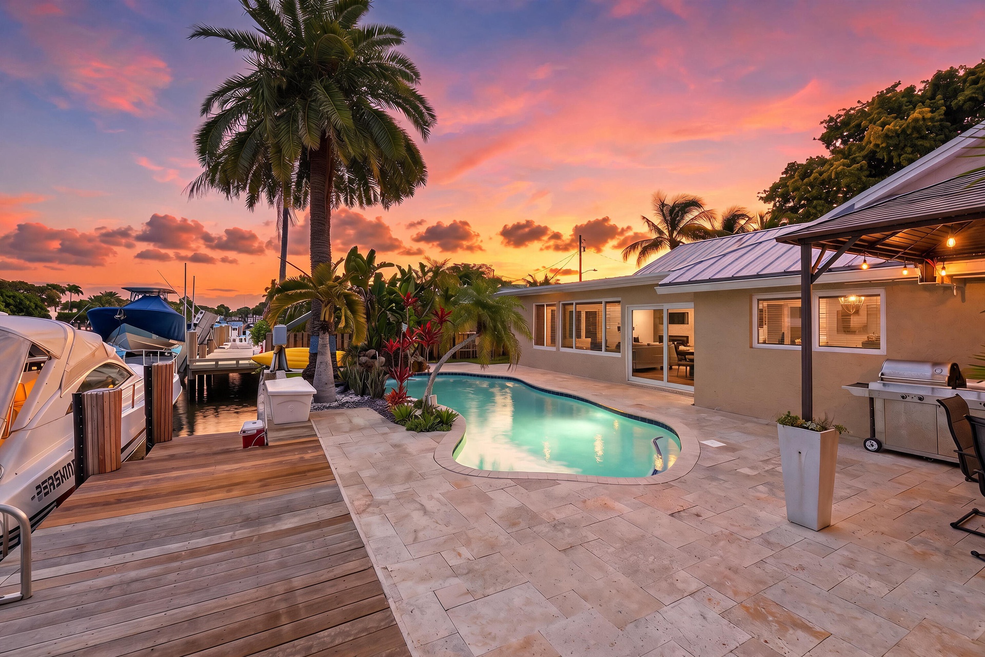 WOW! Your Ocean Access, Waterfront Lifestyle at it's Finest! 40' Dock, 70' Seawall, Freeform Pool with Rock Waterfall, Covered Patio Space for Fail Sa