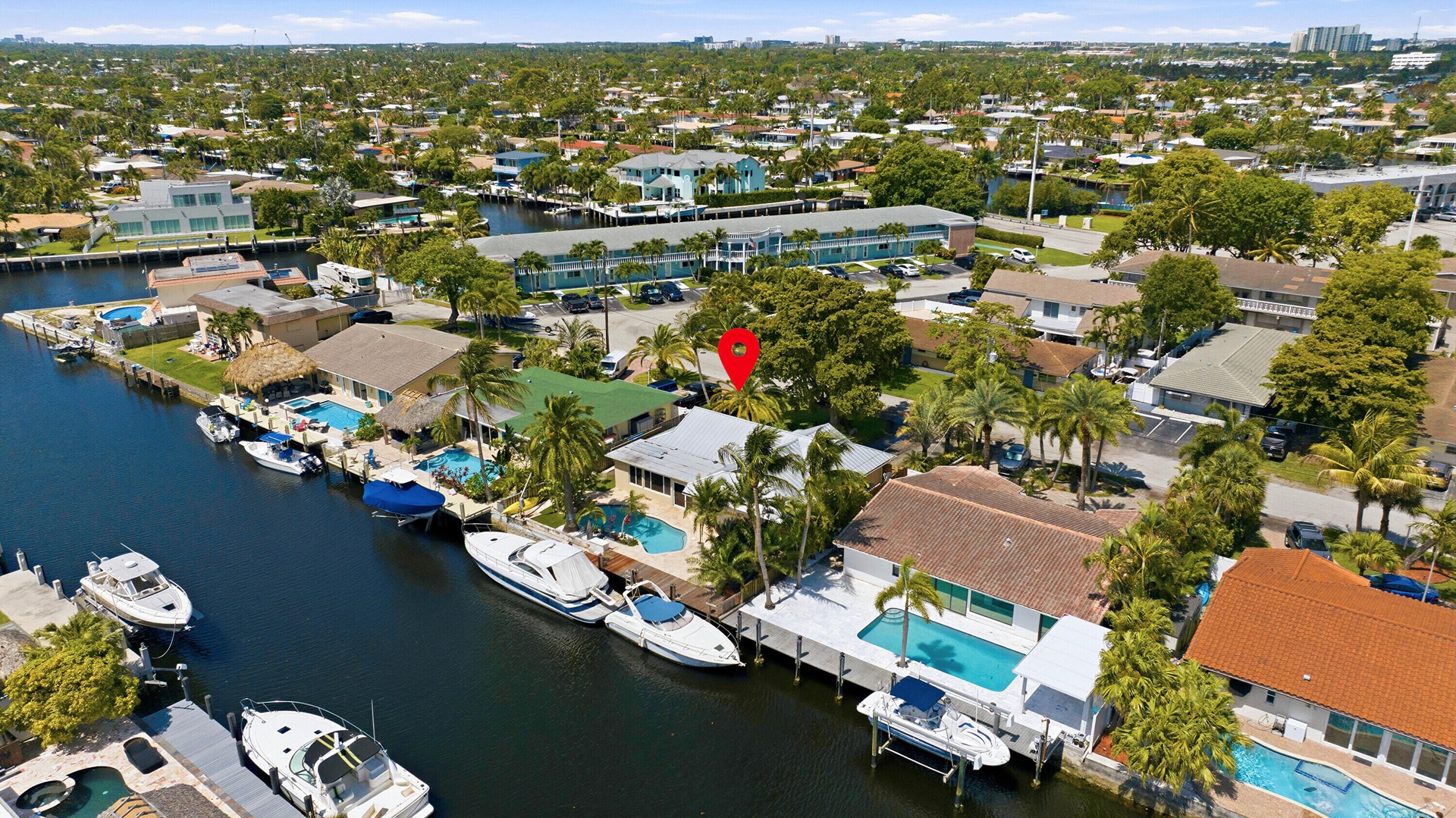 Your Future Home is located on a CANAL WITH OCEAN ACCESS & on a Quiet Street. 42' DOCK, 70' SEAWALL RESURFACED (2026) & NEW ALUMINUM ROOF (2024). No t