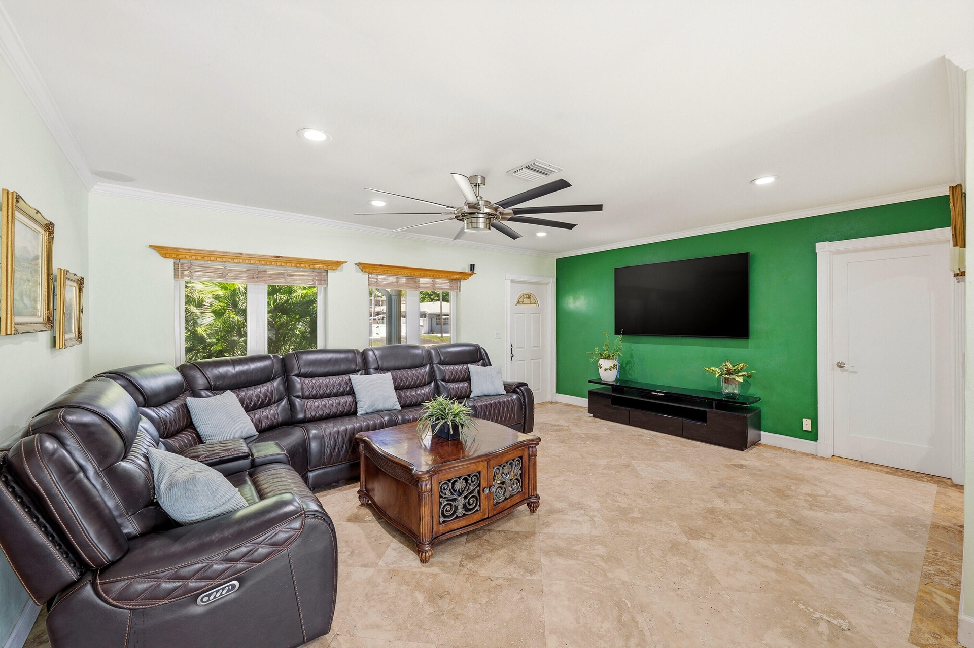 Your Living Room is Spacious & a Flexible Room. Impact Windows & Doors, LED Lighting and 18" Travertine Tile Floors 2025. Easy Access to Backyard, Kit