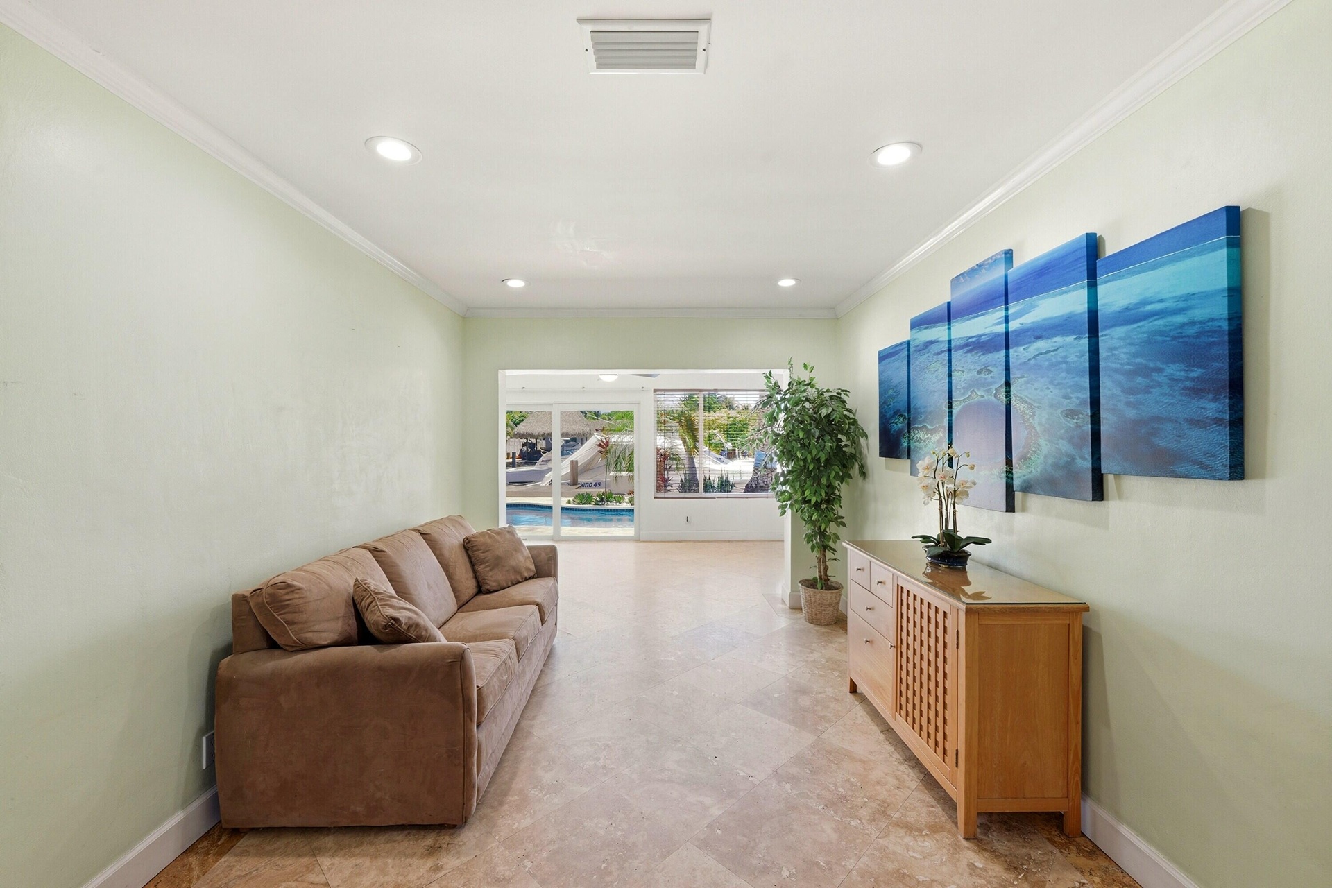 Living Room Extends towards the Backyard, Pool Dock Areas. WOW!