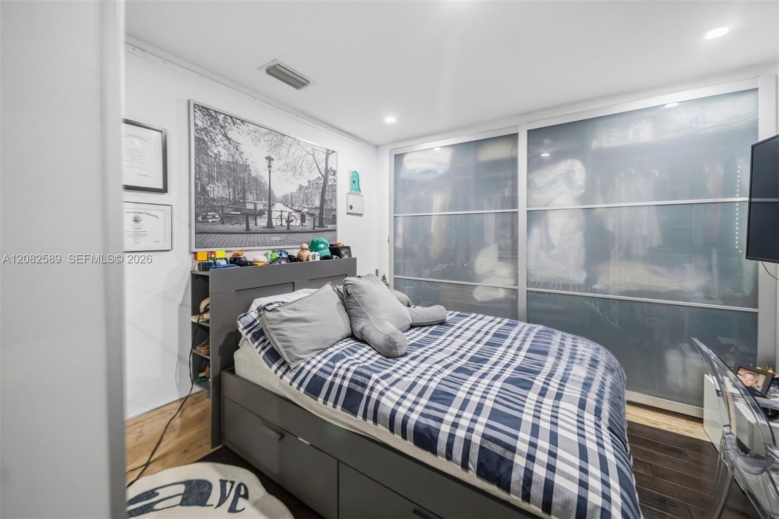 Comfortable Secondary Bedroom 3 featuring a spacious built-in closet and a clean, modern layout.