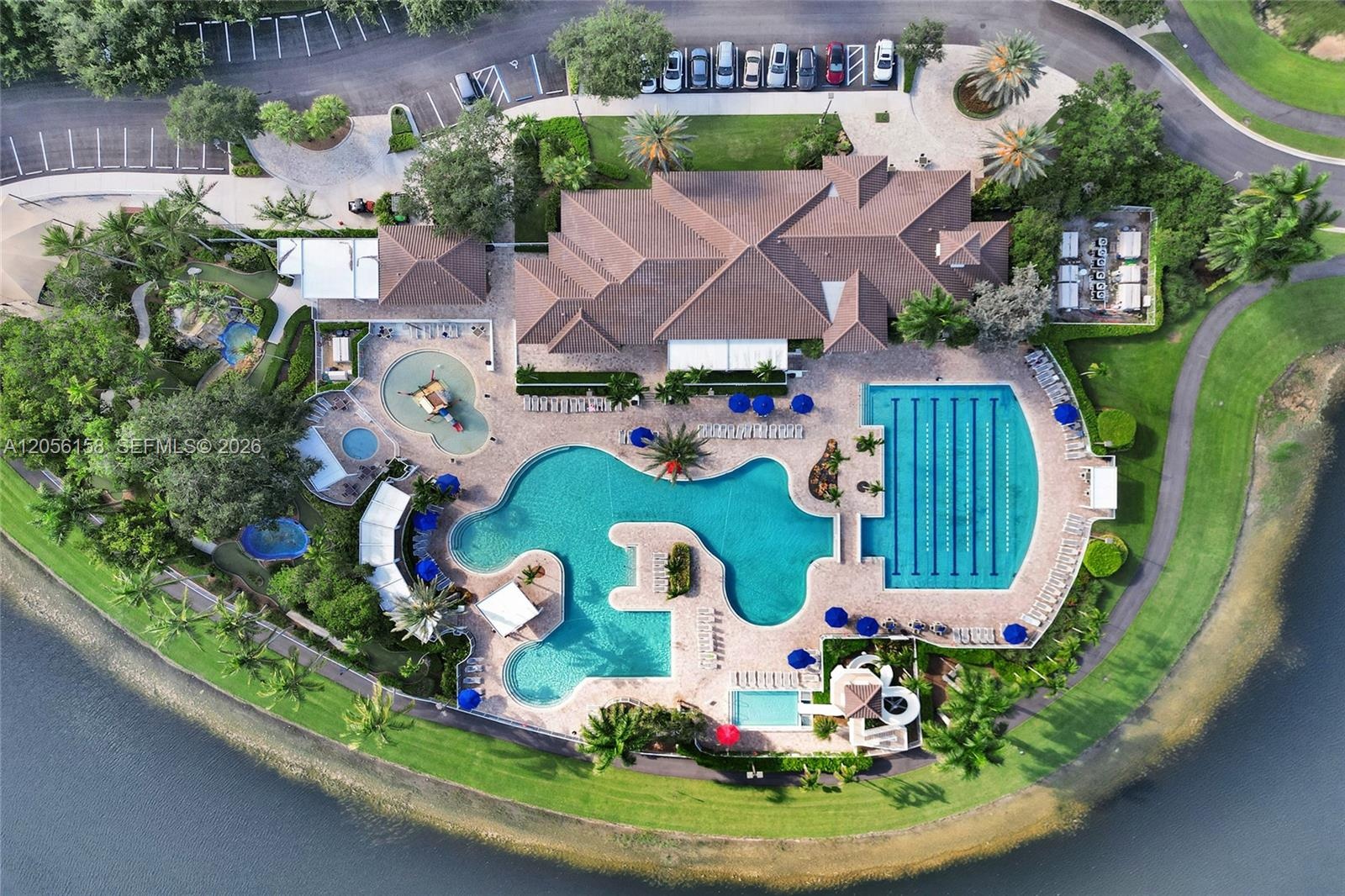A closer aerial view of the pools and the clubhouse