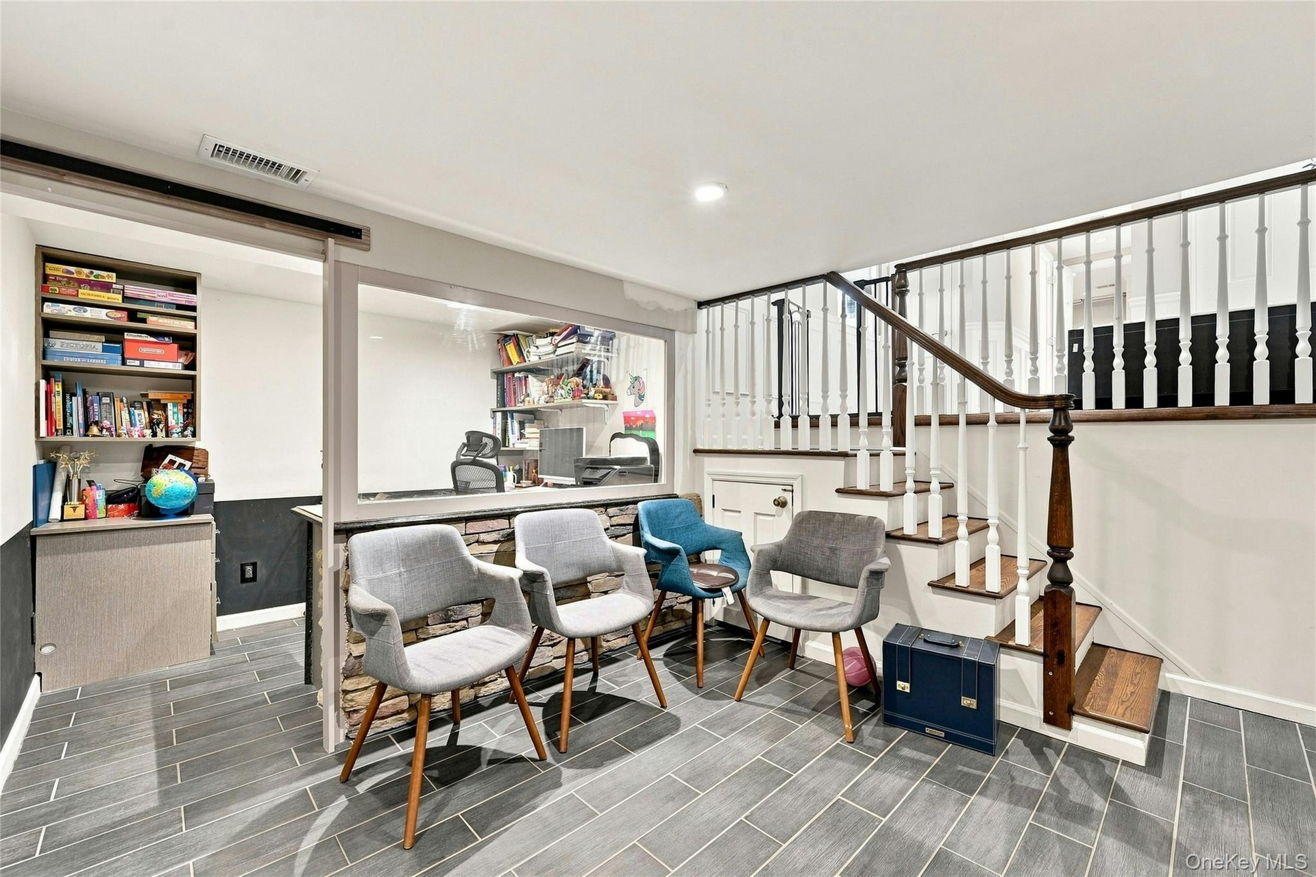 Home office overlooks the den