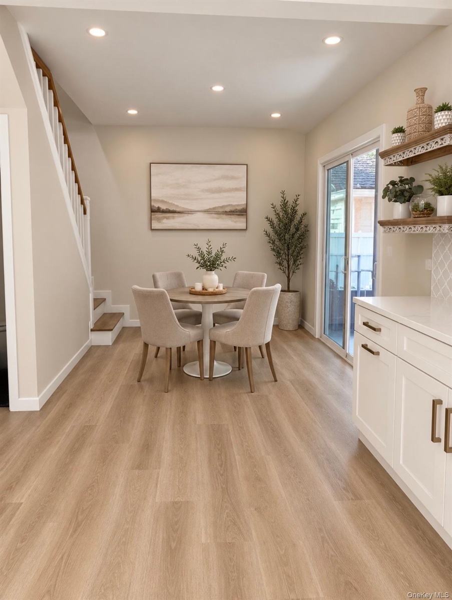 Dining Area w/Slider To Patio. Digitally Staged.