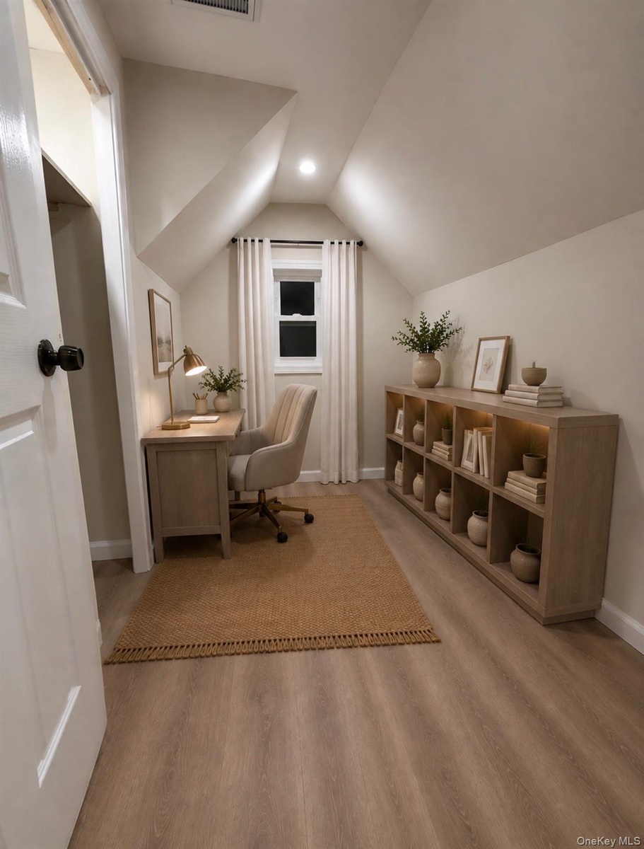 Primary Bedroom Office/Nursery/Walk-In Closet. Digitally Staged.