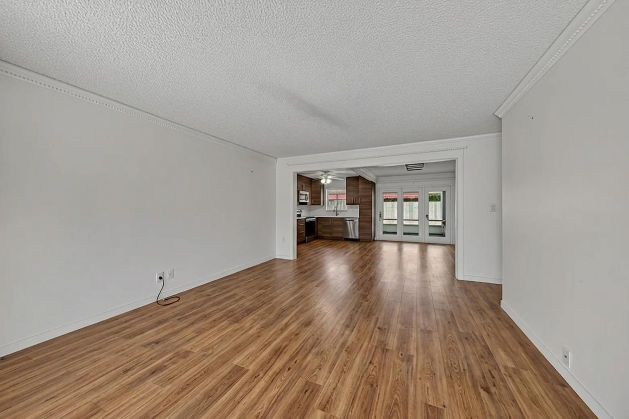 Staged with updated floors and kitchen