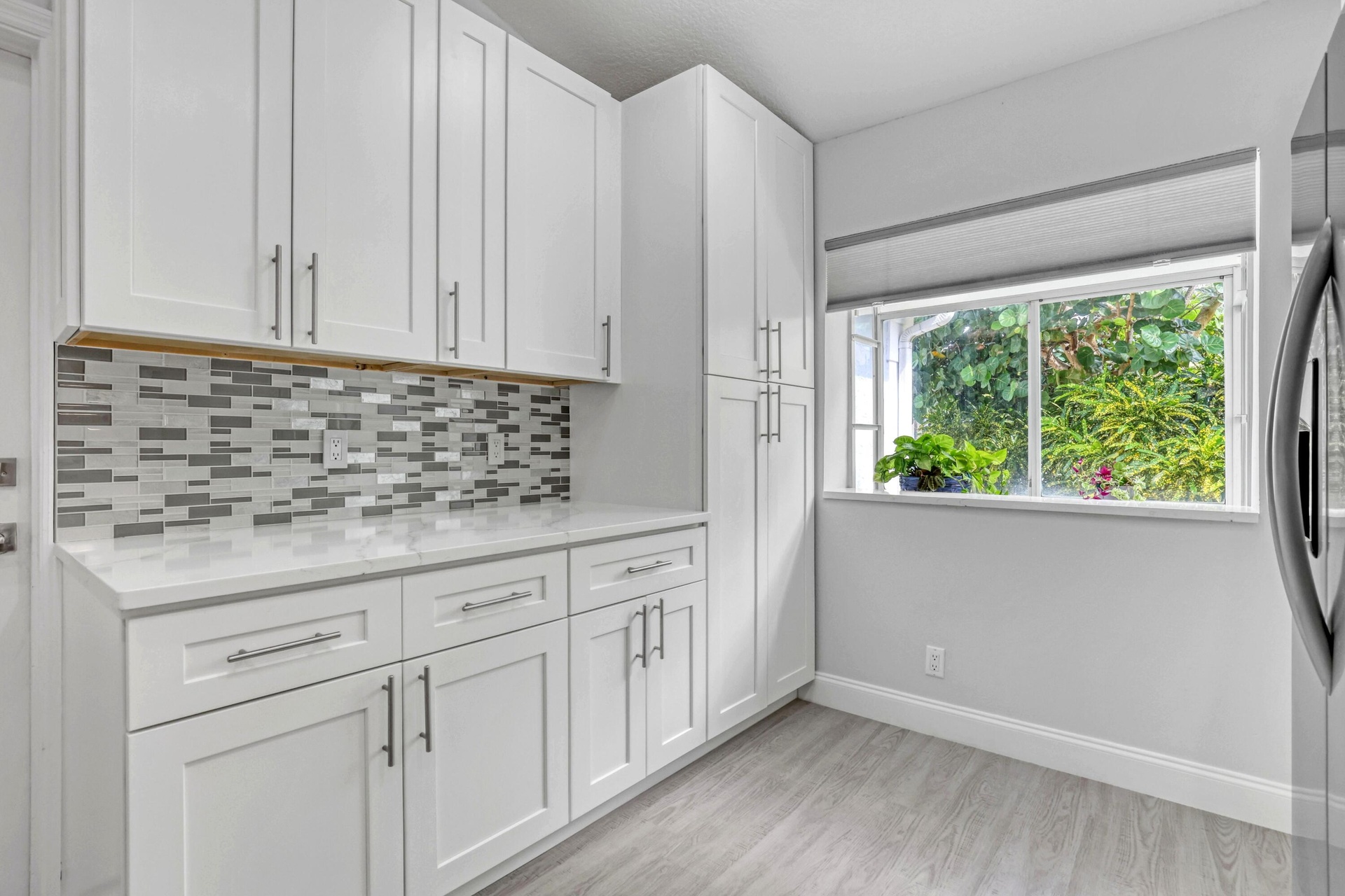 Cabinets are full with everything you need from fancy wine glasses to Tervis tumblers.