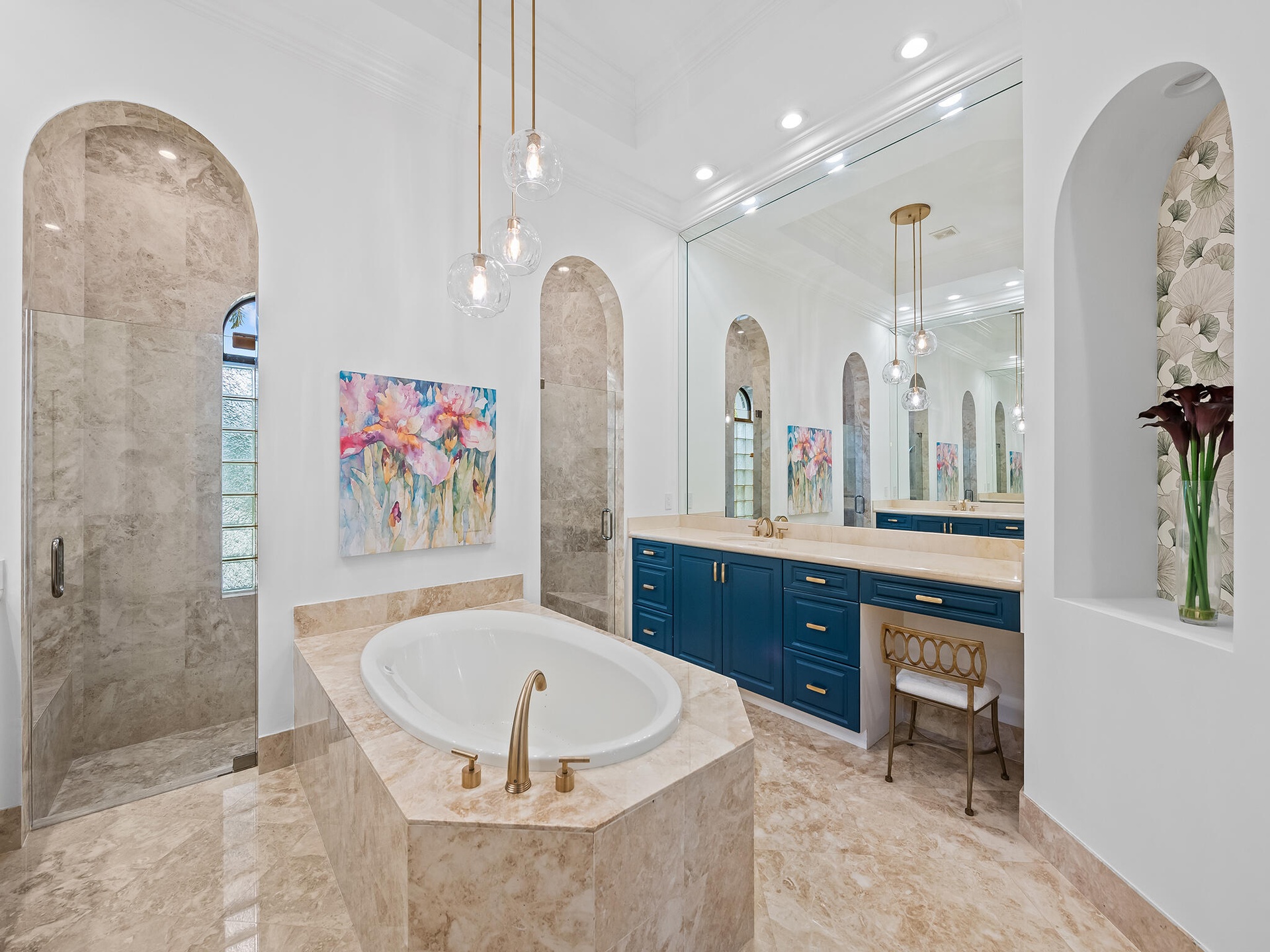 Primary Bath with Marble Floors, Walls and Marble Slab Vanity Tops and Walk Around Shower