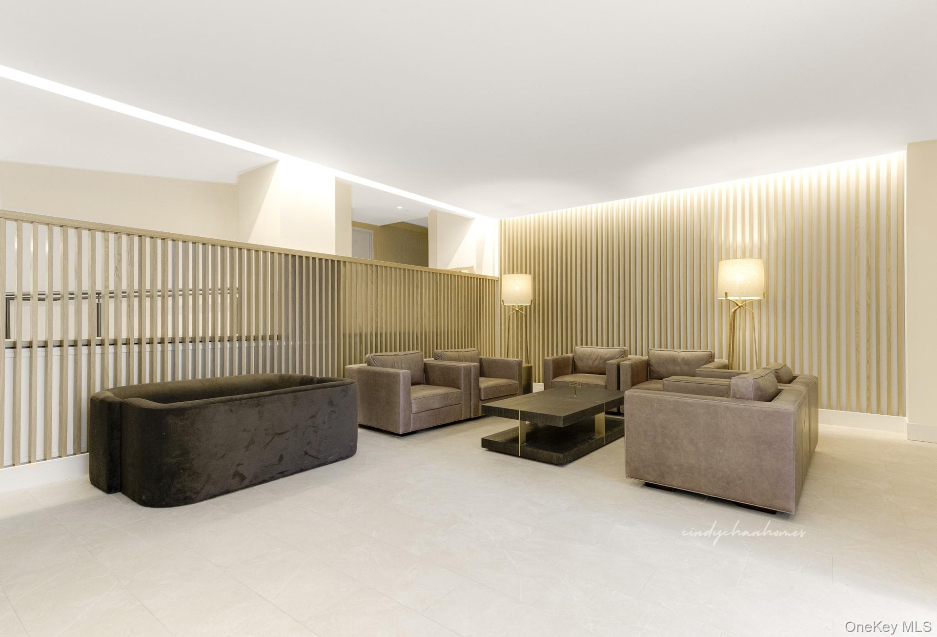 Living area featuring baseboards