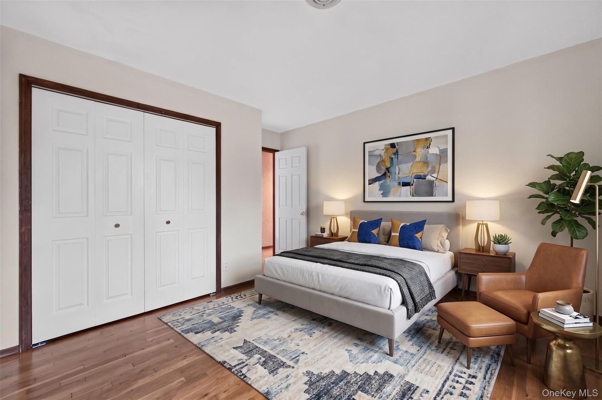 Virtual furnishings 2nd bedroom but same shiny wood floors.