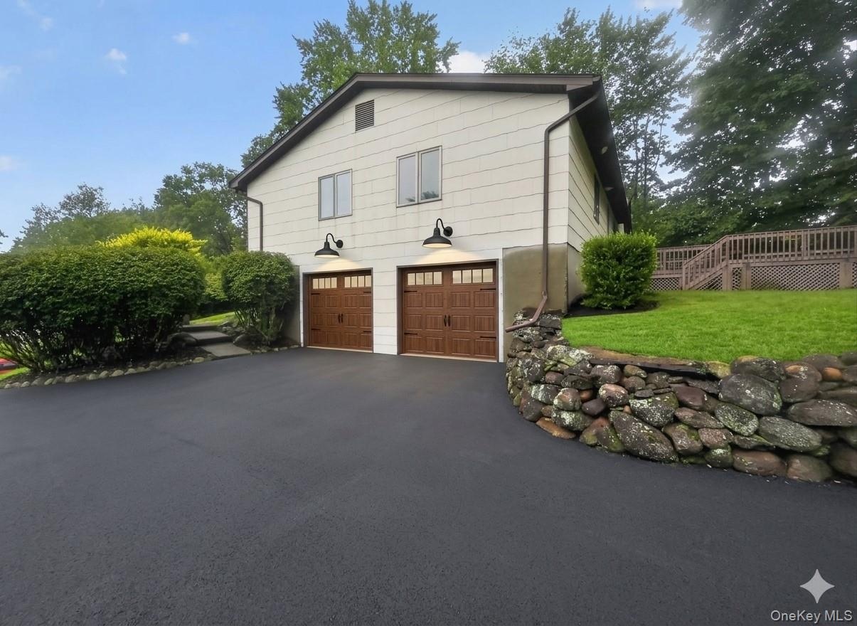 Photo virtually shows what new garage doors can look like