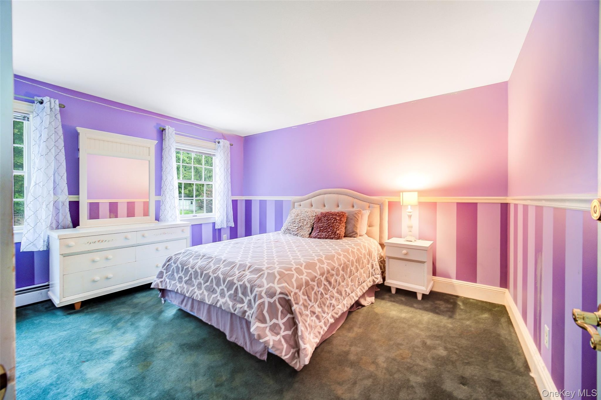 Bedroom #4 This room is carpeted and has custom chair rail