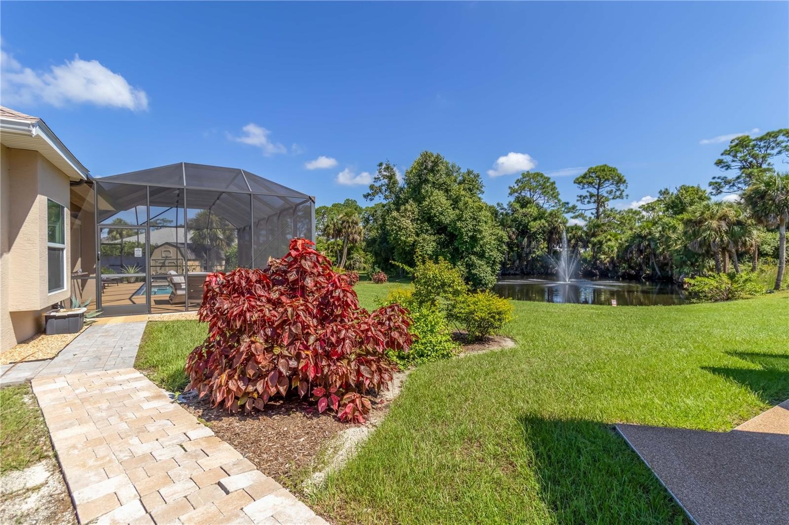 The lot has plenty of open space but plenty of mature tress too for privacy. I just love that fountain. The sellers have a picture of otters that were