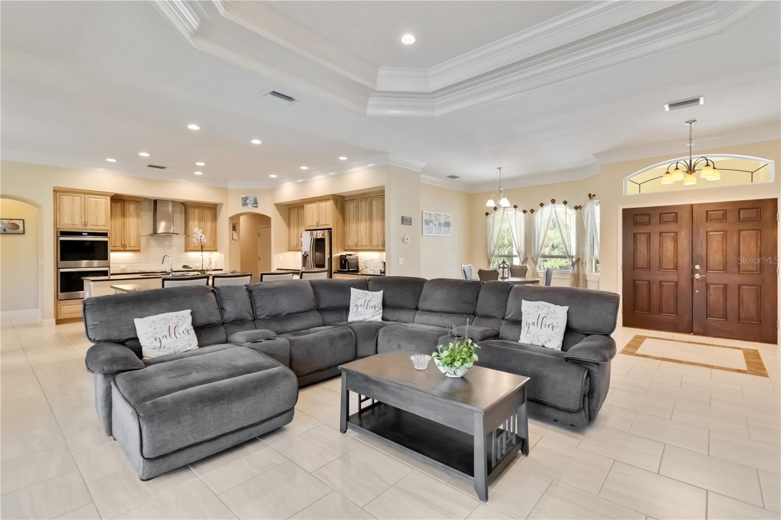 This home has an open floor plan. There are ten foot ceilings throughout the home and a tray ceiling in the great room (as shown above) and the primar