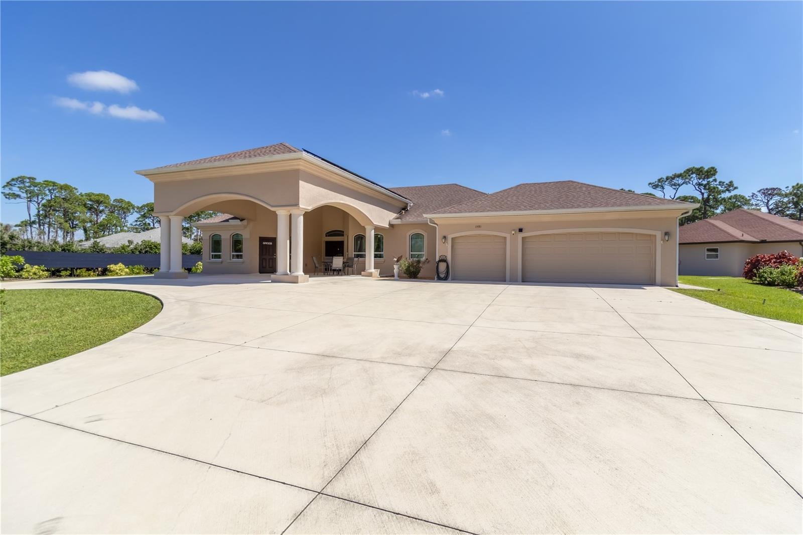 The main home has a 3 car garage, office, three bedrooms, two bathrooms and so much more.