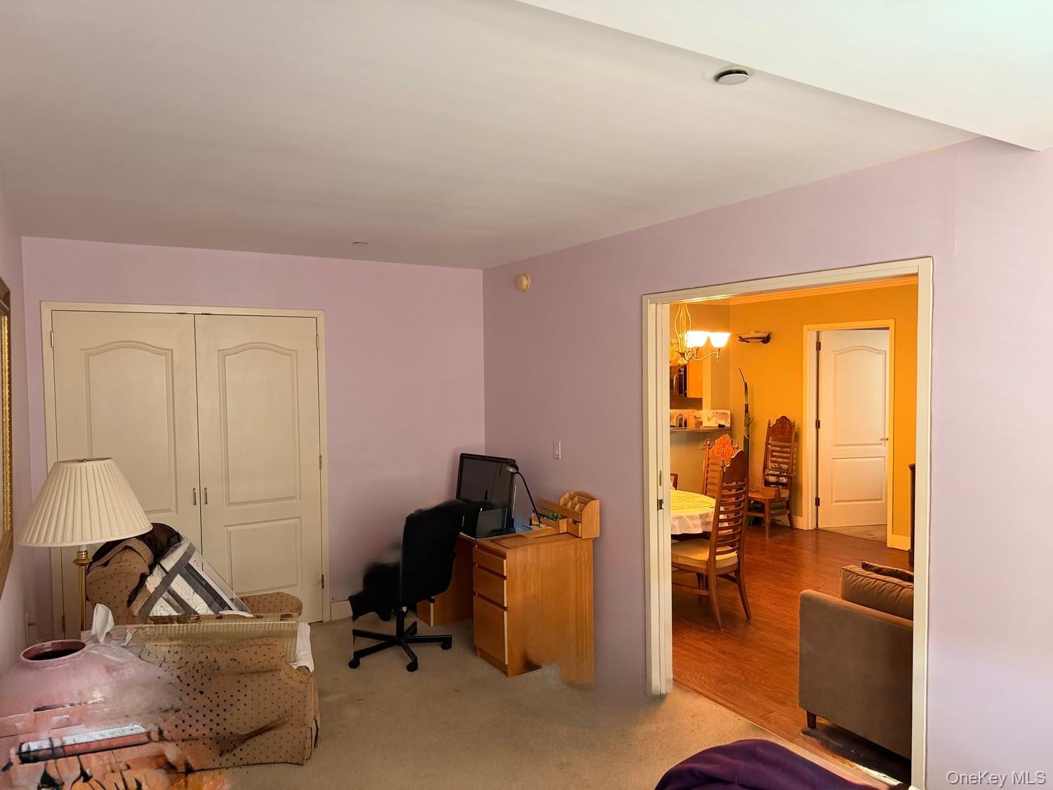Second bedroom with pocket doors if you wish to convert to additional living area, den, office or tv room with large, oversized closet as shown