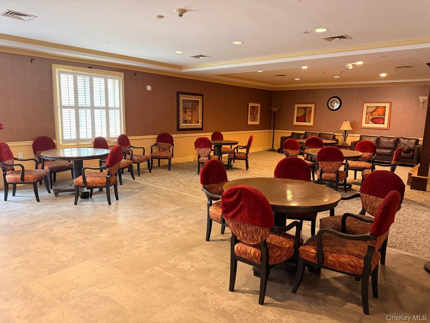 Over sized party room with fireplace, piano and lounge chair available can be rented/reserved