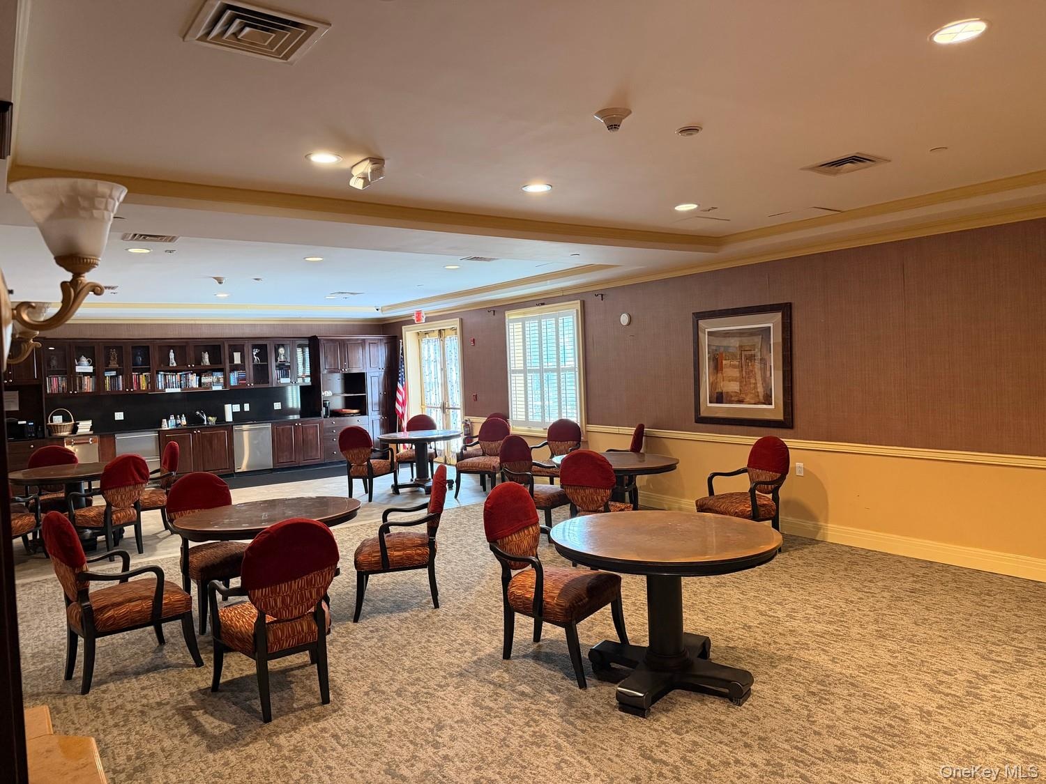Over sized party room with fireplace, piano and lounge chairs available can be rented/reserved