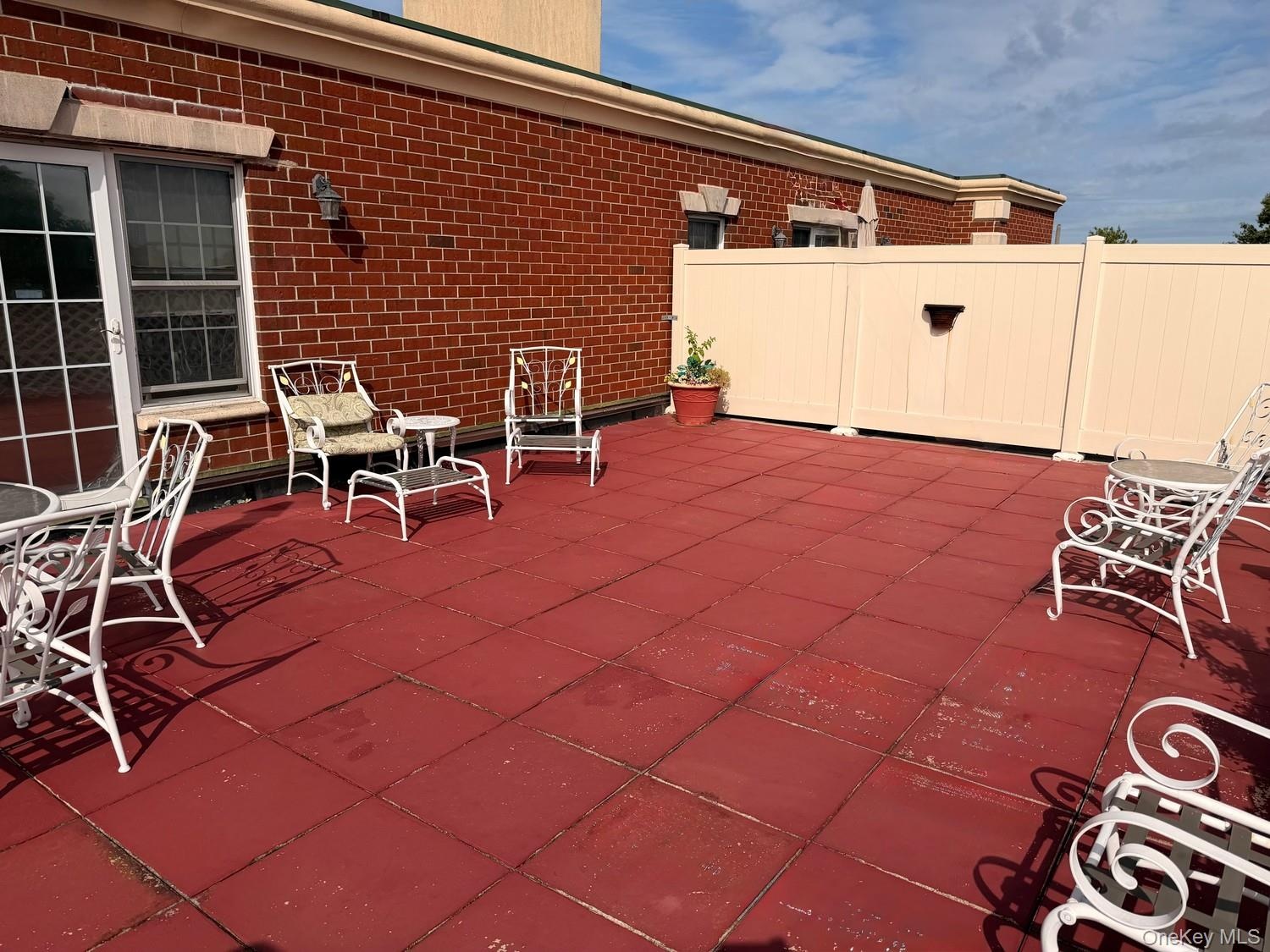 Rooftop patio boasts spectacular early morning sunrises views and views of Eisenhower Park especially during firework shows.