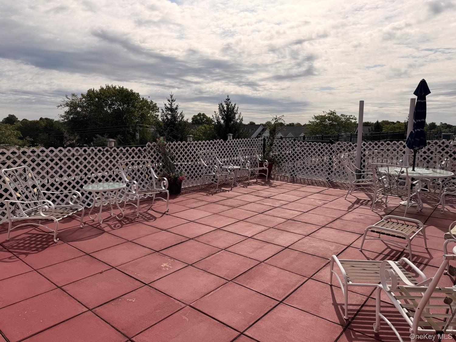 Rooftop patio boasts spectacular early morning sunrises views and views of Eisenhower Park especially during firework shows.