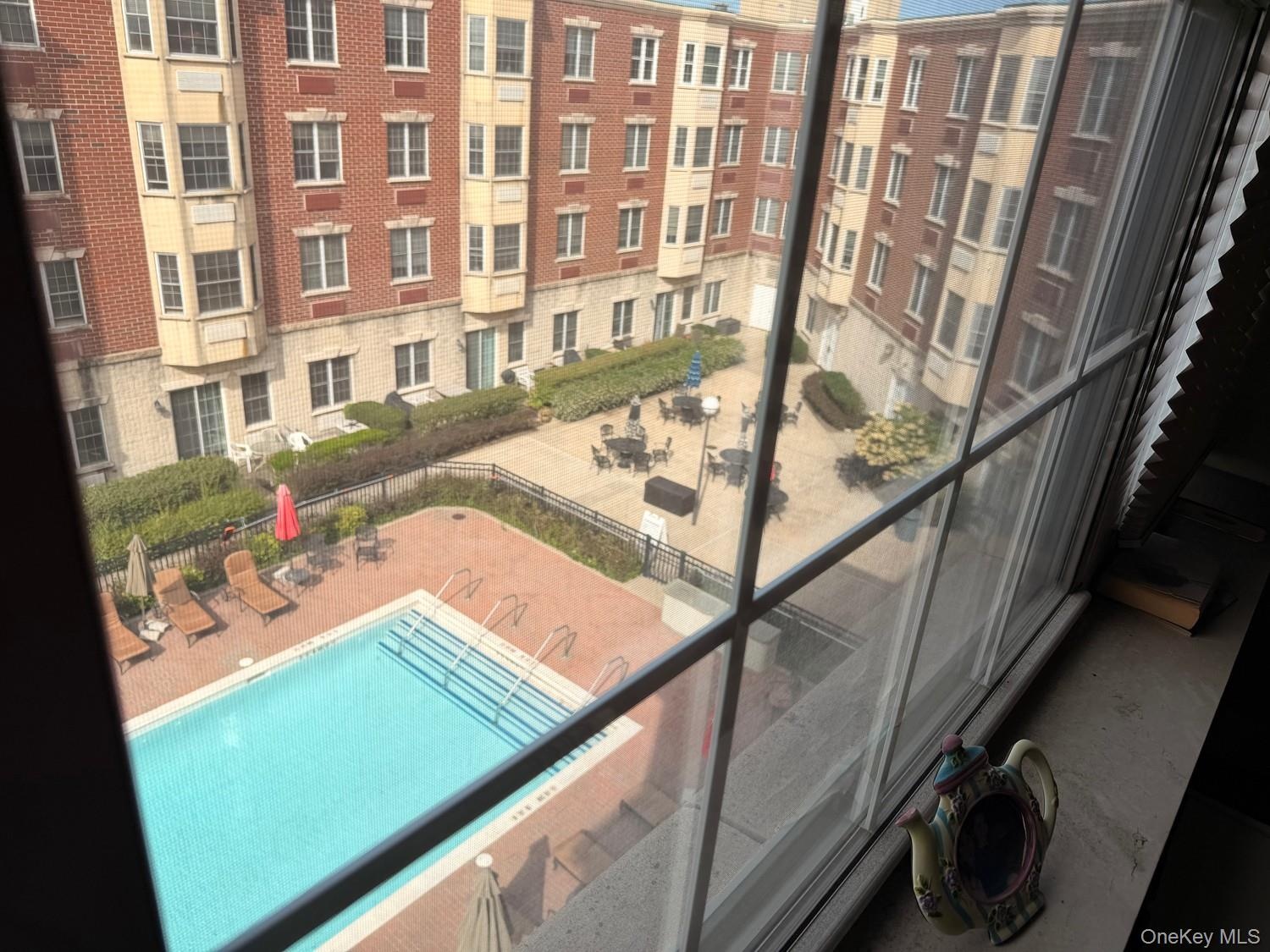 View of courtyard and heated pool from the living room.