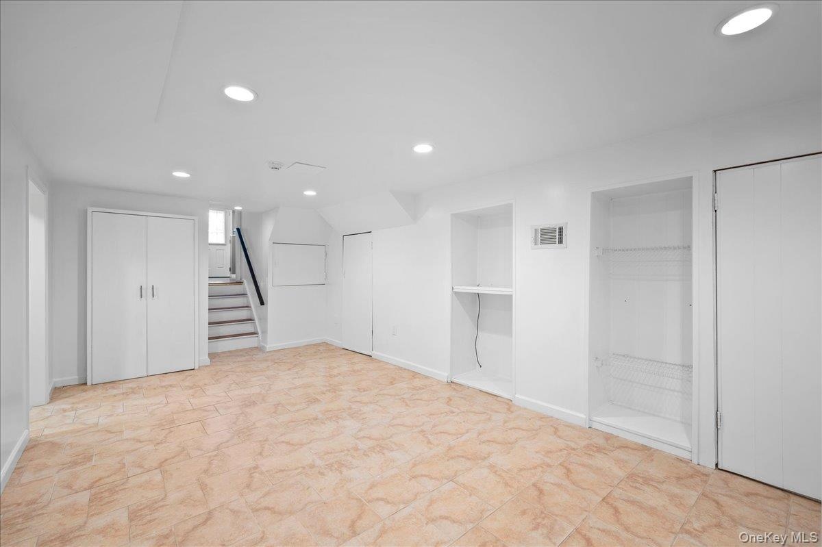Lower level half finished many options. Man cave/playroom/ You decide