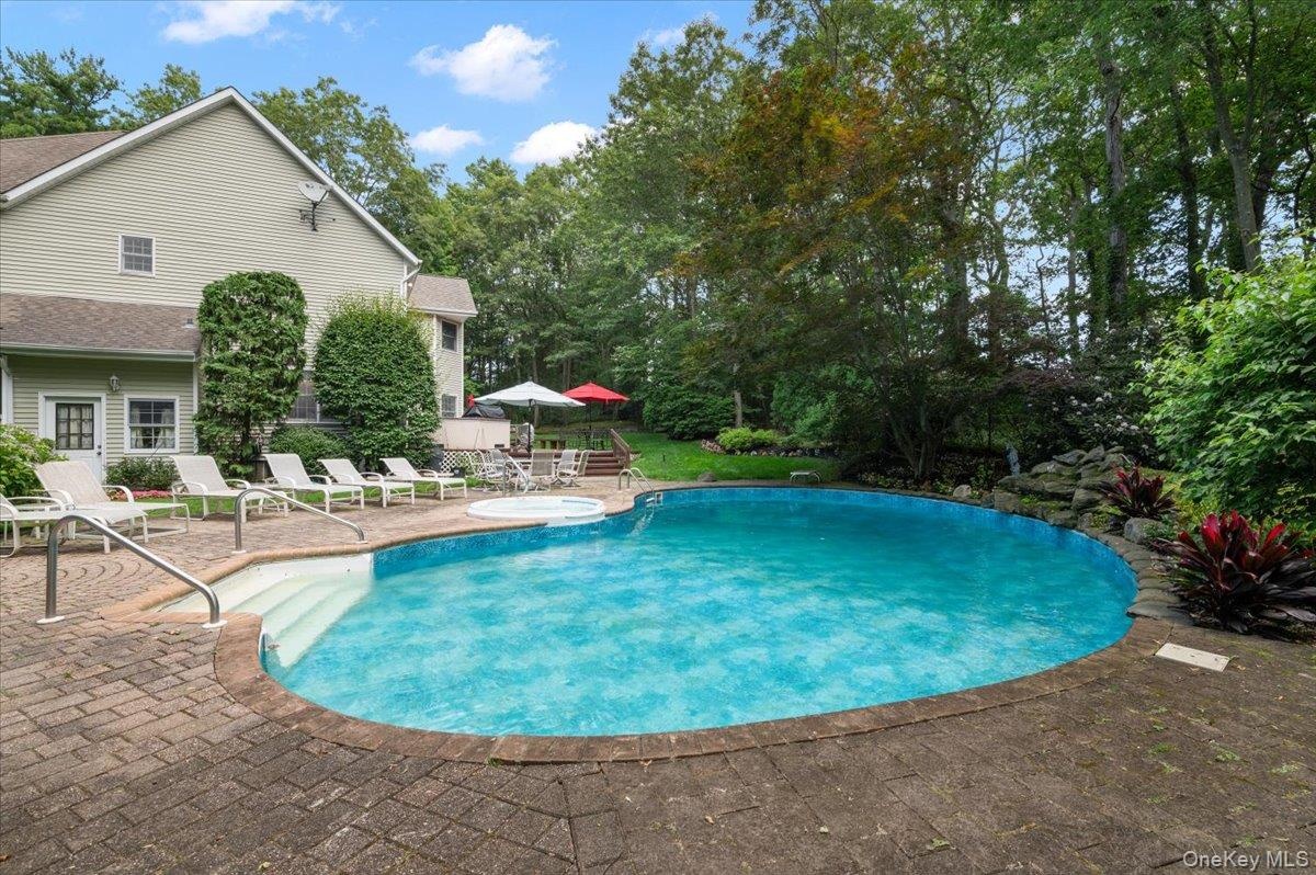 Heated Pool w/ Waterfall & Paver Patio