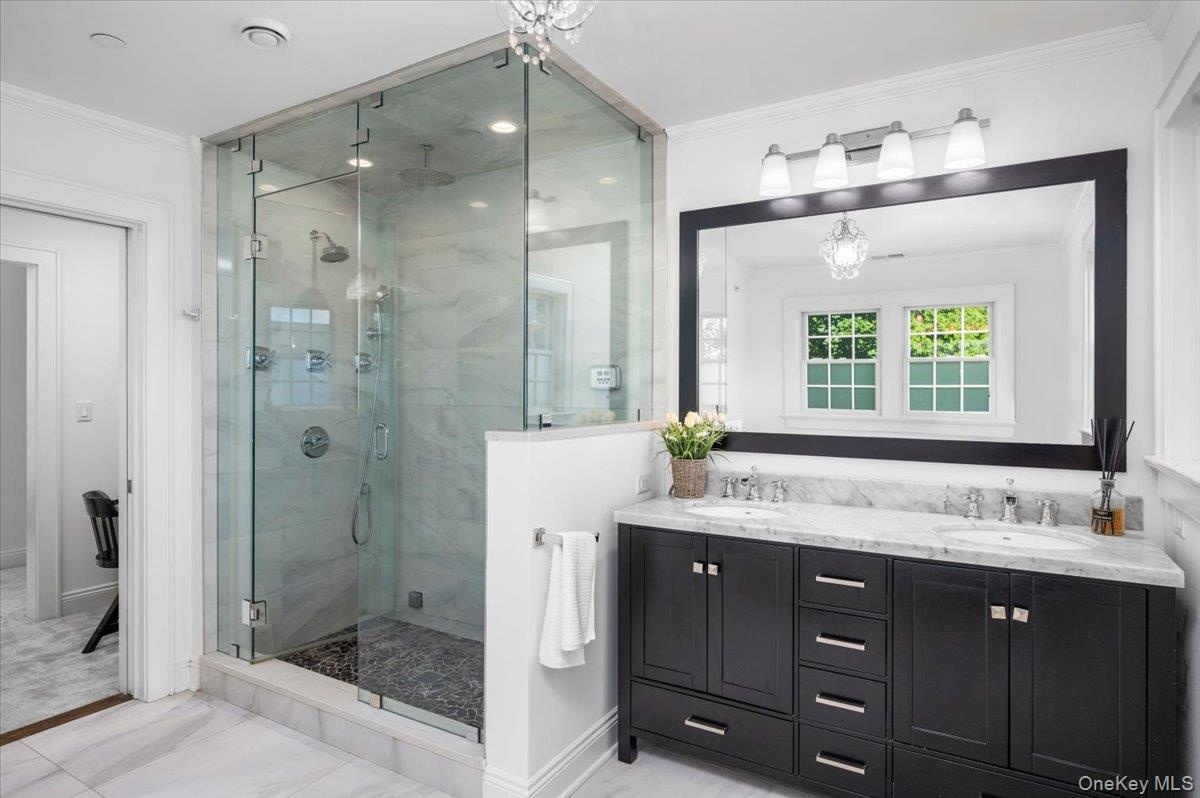 Spa-like primary bath with steam shower