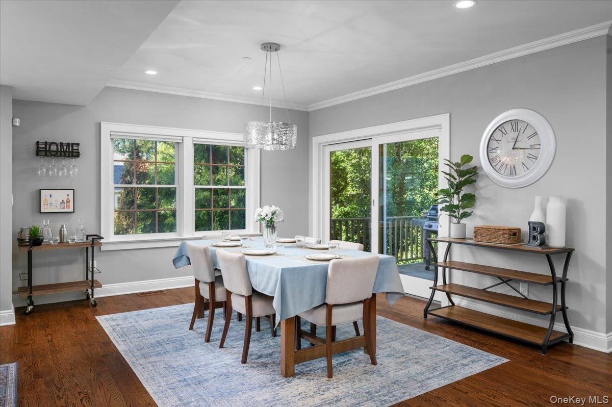 Separate dining with direct access to the deck and backyard.