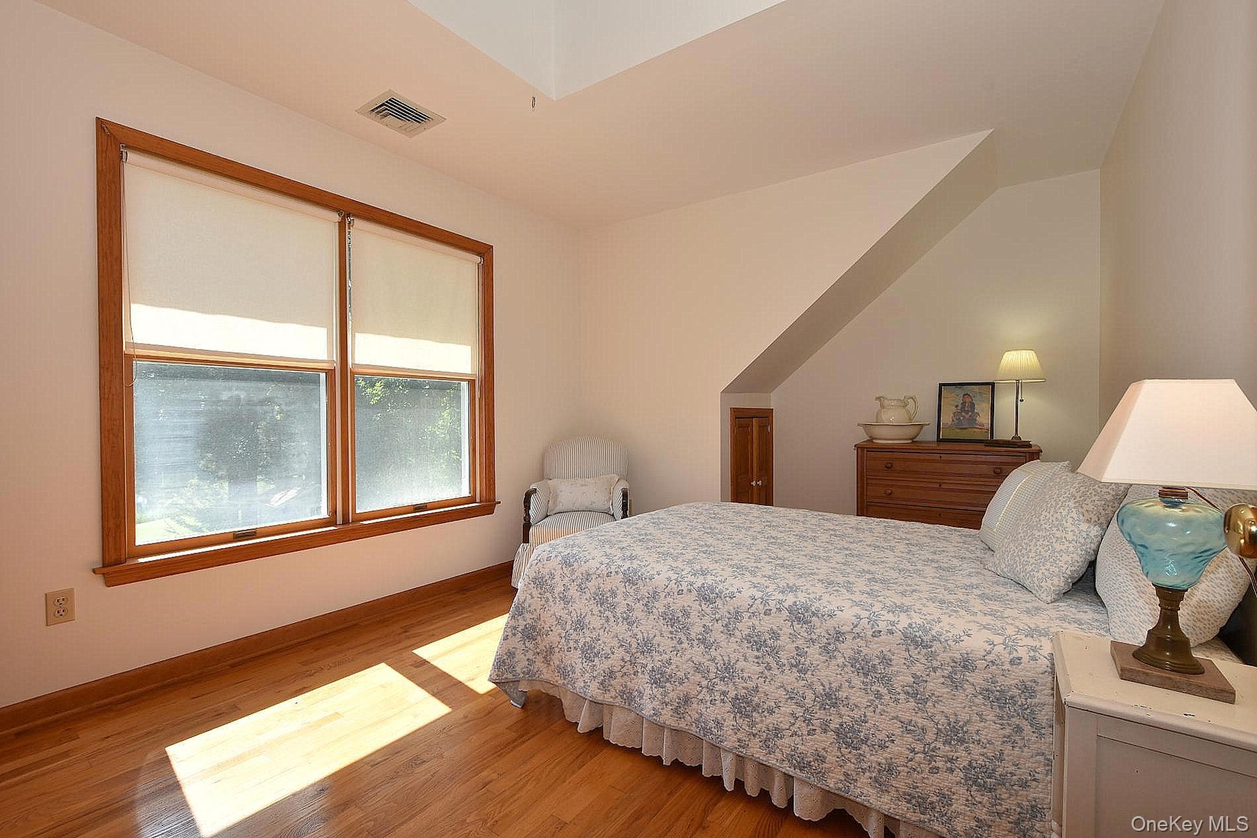 Upper level bedroom with waterviews