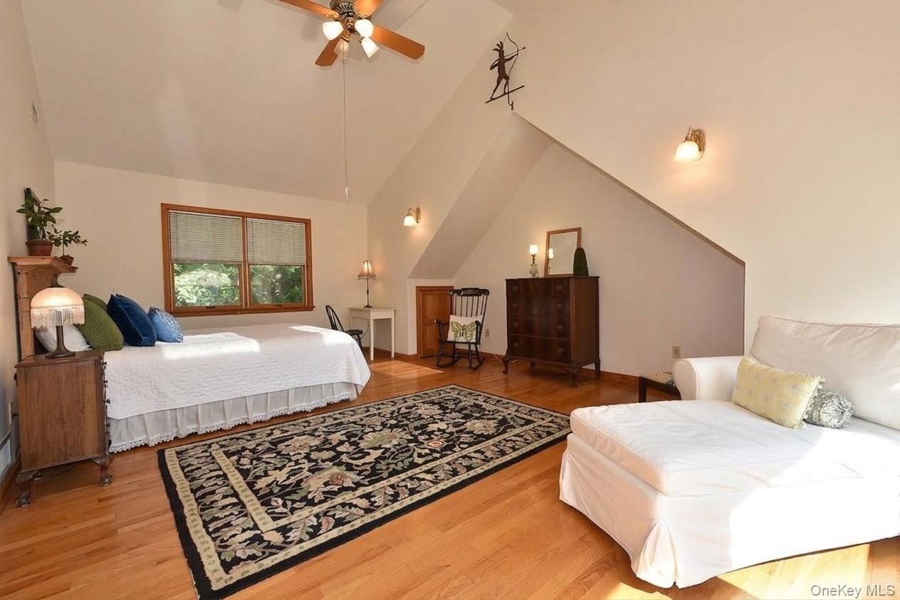 Primary Bedroom with vaulted ceiling, waterviews and 3 closets