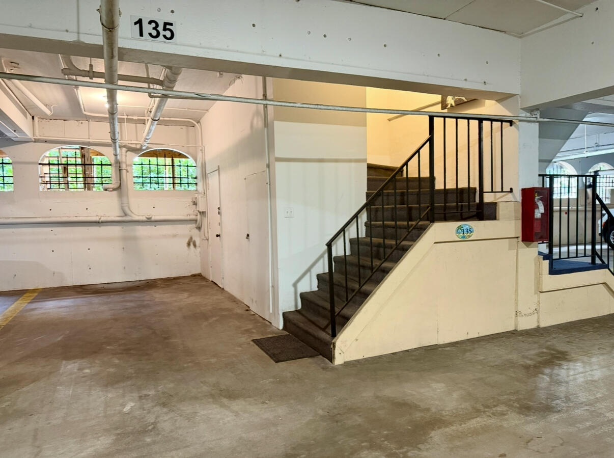 2 dedicated parking spots directly near garage entrance in to home plus 2 storage units.
