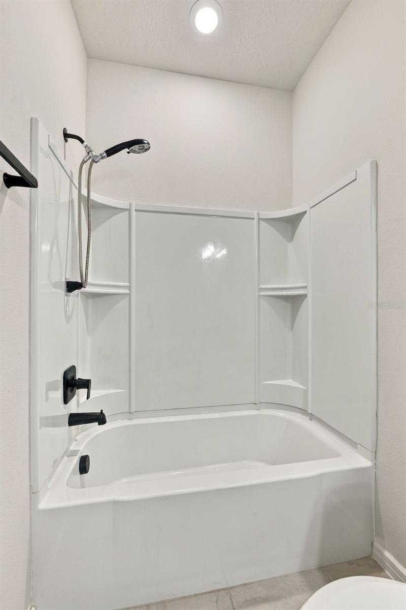 Downstairs Shower #3 This Bathroom is inside Room #5 by the Laundry Room