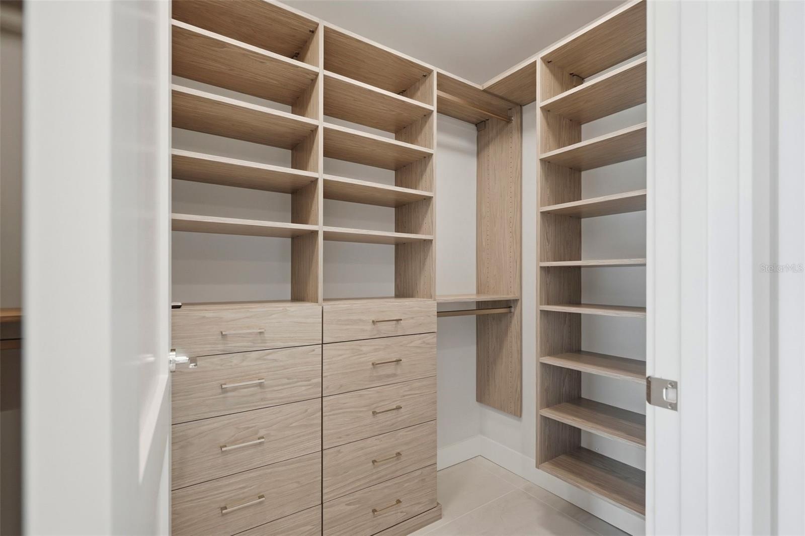 Dual Primary Closets with California Closets systems
